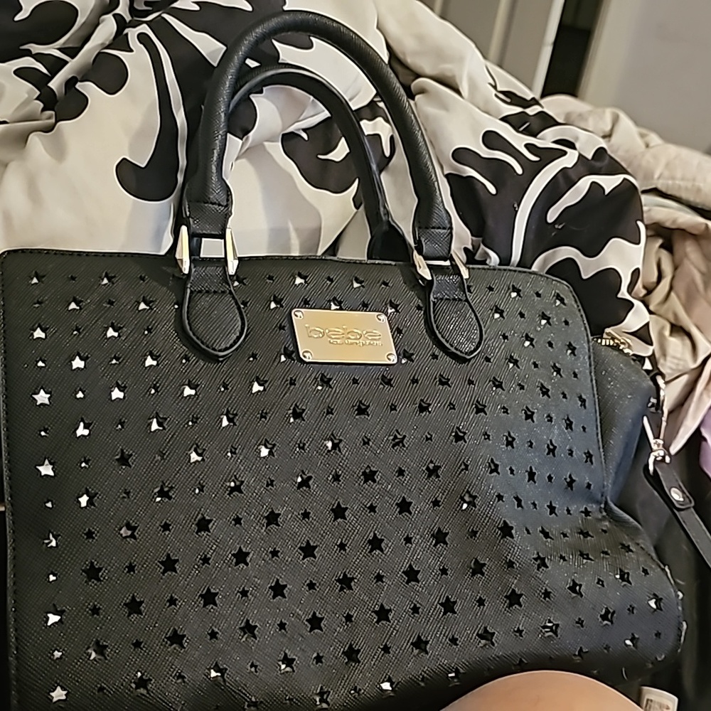 Black with silver stars bebe satchel with crossbody strap